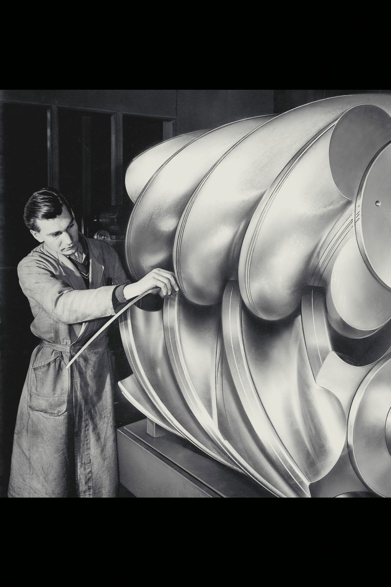 Rotors of a screw compressor - an old black-and-white photo